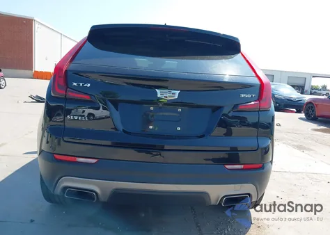 2021 Cadillac Xt4 Fwd Premium Luxury from USA, damaged, VIN 1GYFZCR46MF015221